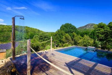 Like the rest of the build, the pool shower is very simply designed reflecting an overall look that is pared down to the essentials.