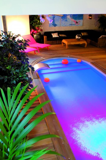 Indoor pool with a water curtain