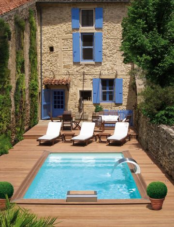 small inground pool in a small courtyard