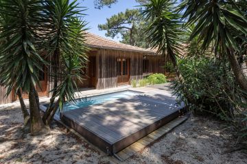 Petite piscine enterrée moins de 10m² avec liner gris au Cap Ferret - Piscinelle
