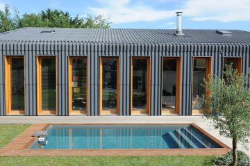 A modern, industrial swimming pool