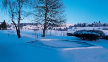 Une piscine Hx dans un milieu urbain sous la neige