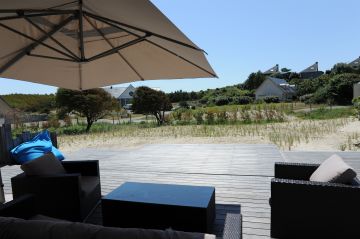 View from the house - once secured, the Rolling-Deck blends in seamlessly with the decking and protects the pool from the unpredictable local weather.