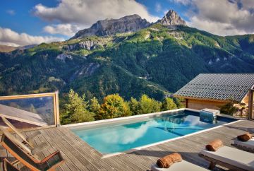 A modern swimming pool in the mountains