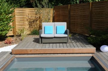 The outdoor sofa moves with the Rolling-Deck, providing a nice spot to contemplate the scene.